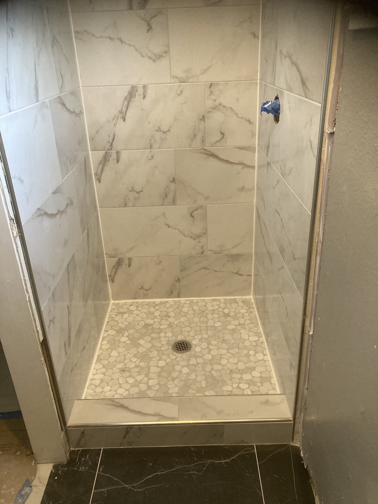 Custom Walk-In Pebble Shower
