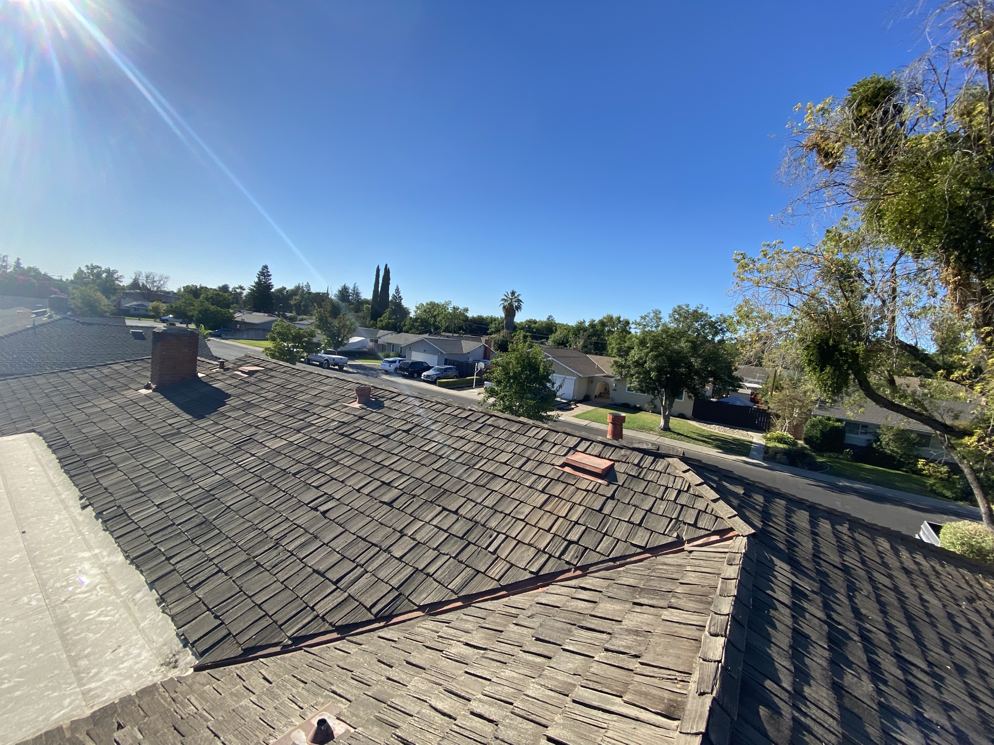 Roofing Replacement — Before: Weathered original wood shake roofing